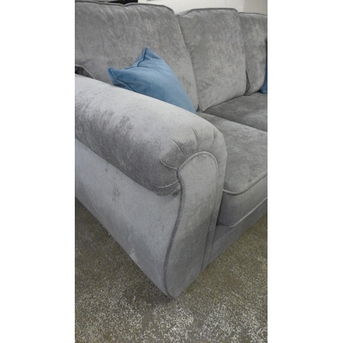 1444 - A small grey upholstered corner sofa