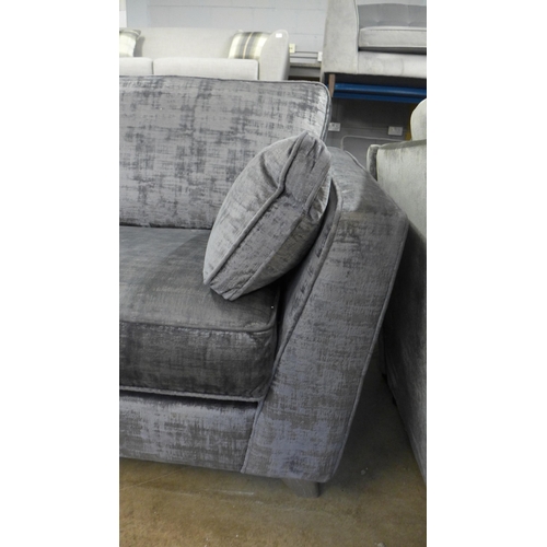 1448 - A charcoal velvet three seater sofa