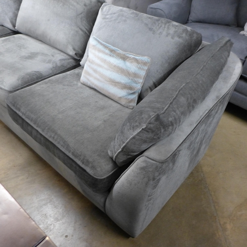 1451 - A pewter velvet corner sofa