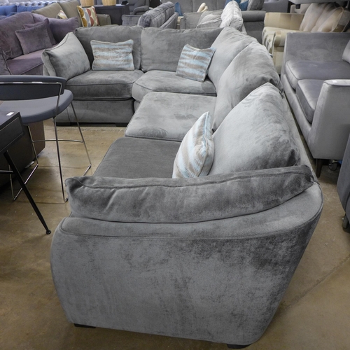 1451 - A pewter velvet corner sofa