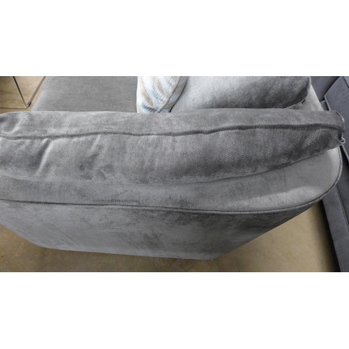 1451 - A pewter velvet corner sofa