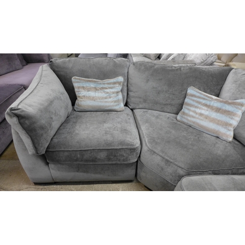 1451 - A pewter velvet corner sofa