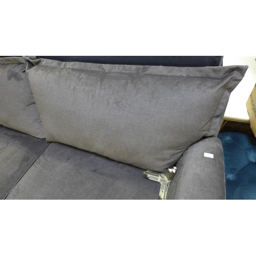 1476 - A grey velvet four seater sofa