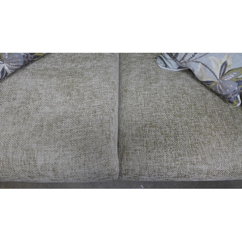 1481 - A sand woven fabric two seater sofa