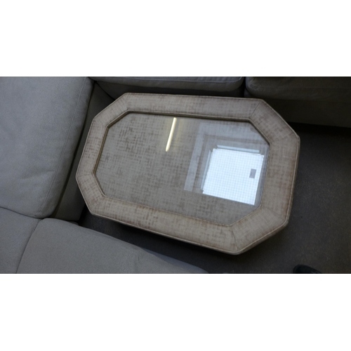 1510 - A gold upholstered and glass coffee table