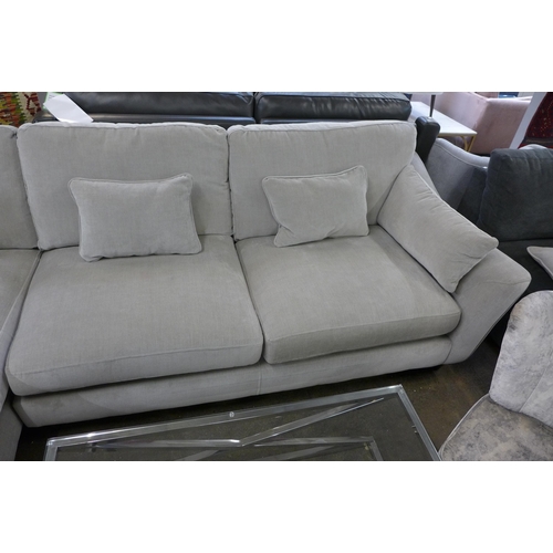 1514 - A grey upholstered L shaped sofa