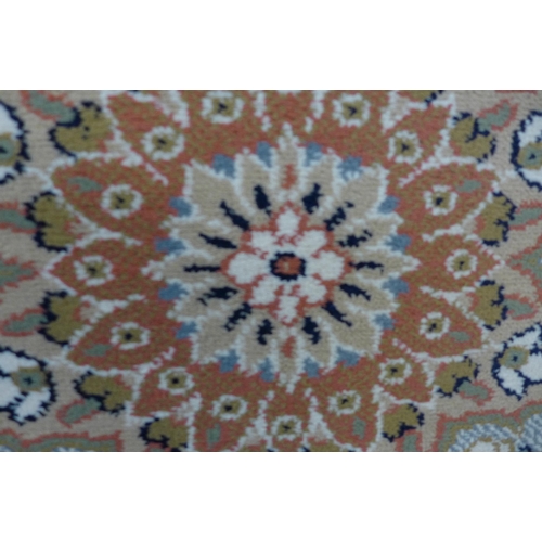 1549 - A cream ground full pile floral patterned rug 300 x 200