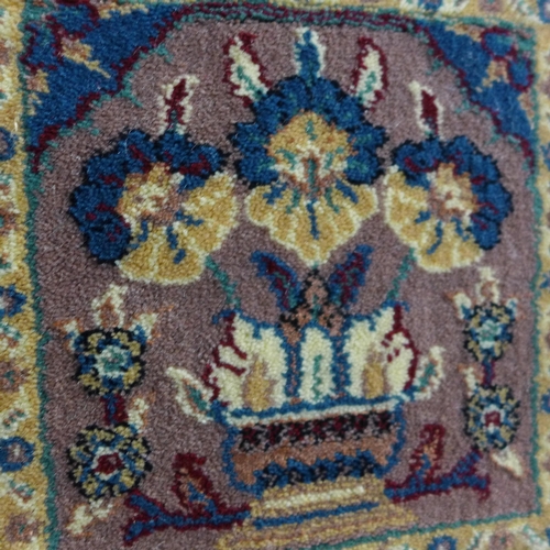 1552 - A blue fine woven ground rug with traditional Persian panel design