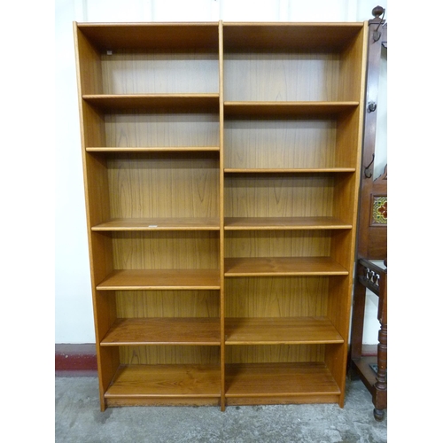 24 - A teak open bookcase