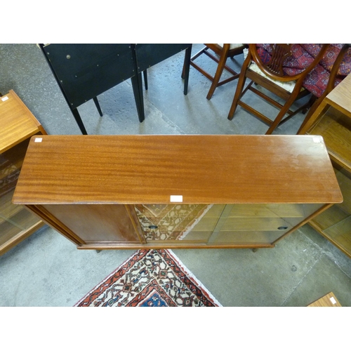 31 - A teak bookcase