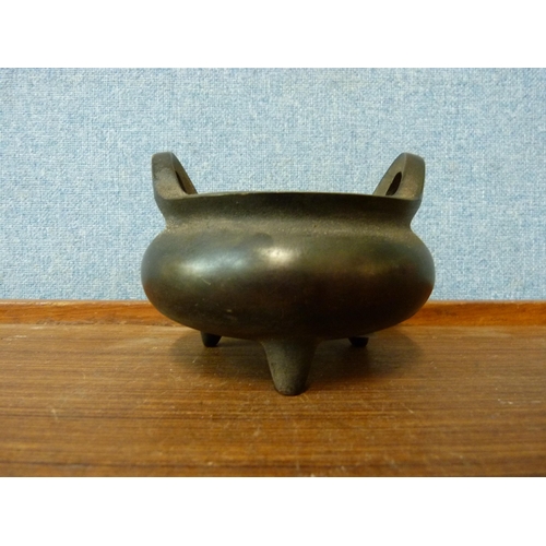 333 - A small oriental bronze censor