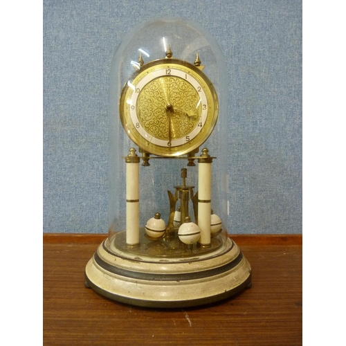 334 - A vintage German brass anniversary clock