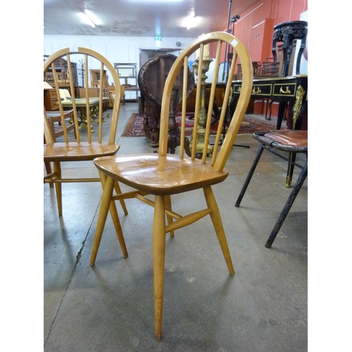 38 - A pair of Ercol Blonde elm and beech Windsor chairs