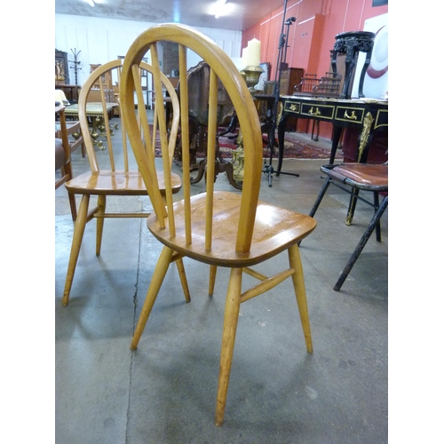 38 - A pair of Ercol Blonde elm and beech Windsor chairs