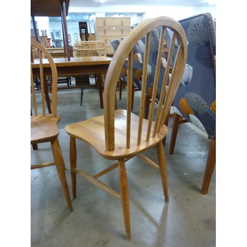 39 - A pair of Ercol Blonde elm and beech Windsor chairs