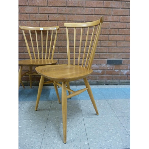 5 - A set of four Ercol Blonde elm and beech 449 model chairs