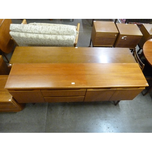 56 - A teak sideboard