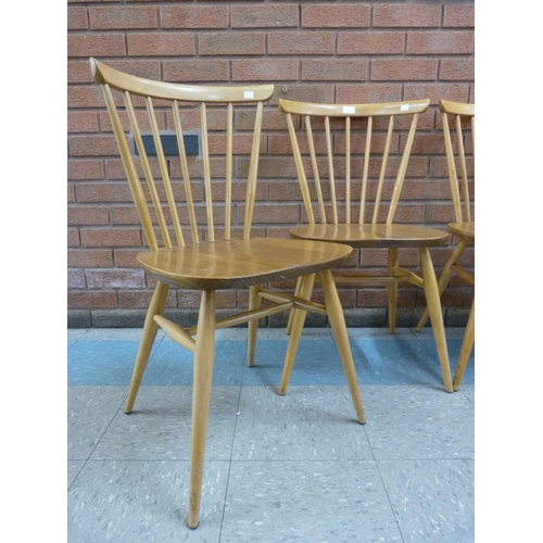 6 - A set of four Ercol Blonde elm and beech 449 model chairs