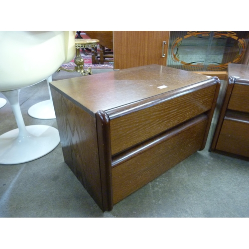 60 - A pair of German Erste Klasse Wohnkomfort ash bedside chests