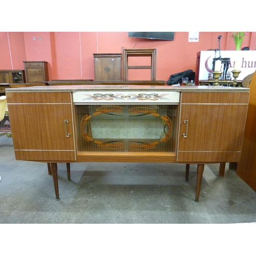 61 - A simulated teak sideboard