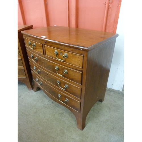 71 - A pair of George III style mahogany bow front bachelors chests of drawers