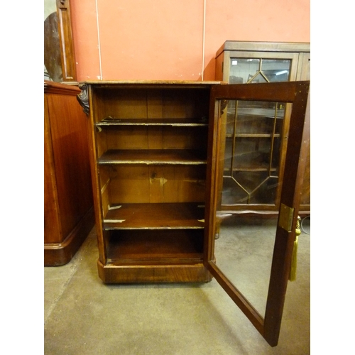 84 - A Victorian inlaid burr walnut music cabinet