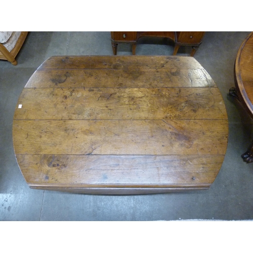 92A - An 18th Century French fruitwood drop leaf farmhouse table