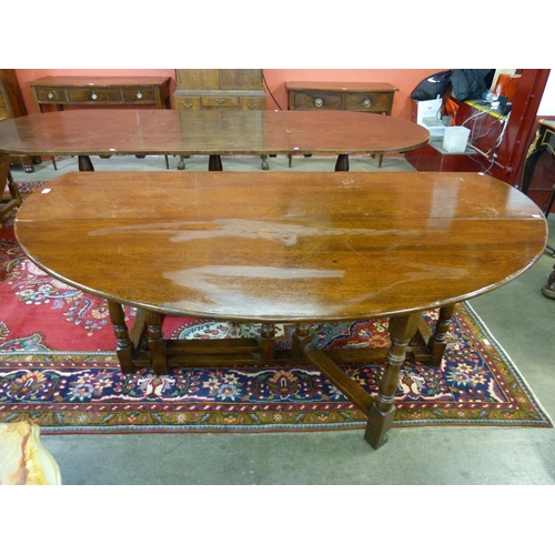 94 - A George III style oak gateleg wake table