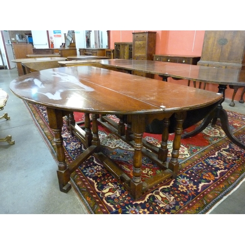 26 - A George III style oak gateleg wake table