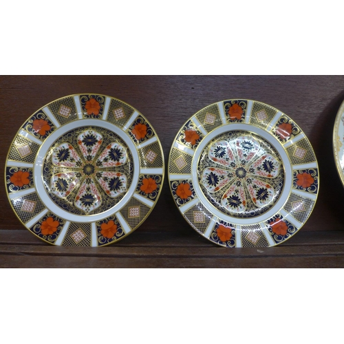 602 - Two Royal Crown Derby Imari 1128 pattern plates, 22cm and two Wedgwood plates, 27cm