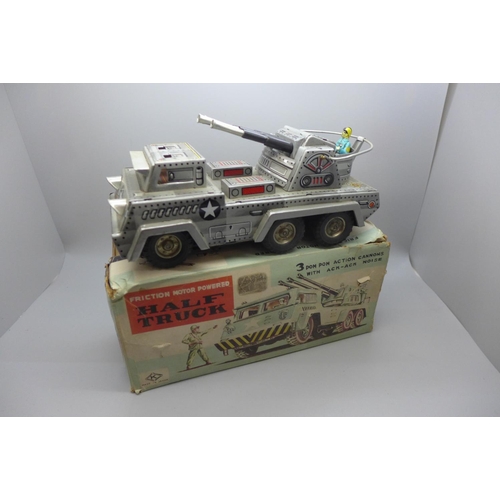 626 - A Japanese tin plate friction powered Half Truck, boxed, box a/f