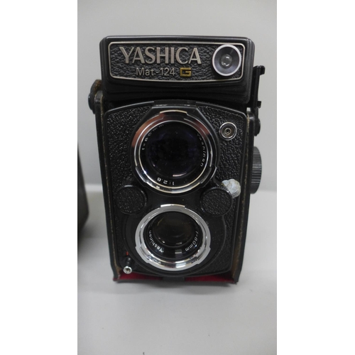 627 - A Yashica Mat-124G medium format TLR camera and one other Yashica 44 camera