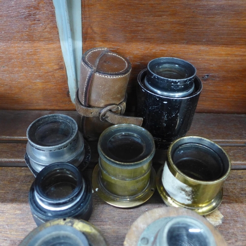 629 - Eight vintage magic lantern/camera lenses