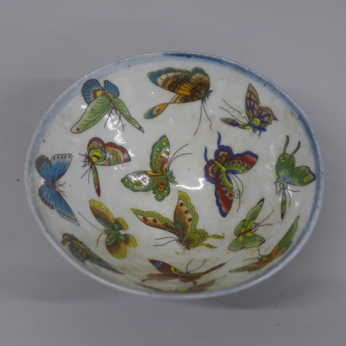 630 - A Chinese butterfly bowl, transfer printed design, 12.5cm diameter