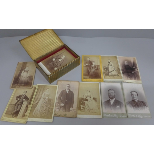 632 - A tin containing 31 cabinet cards