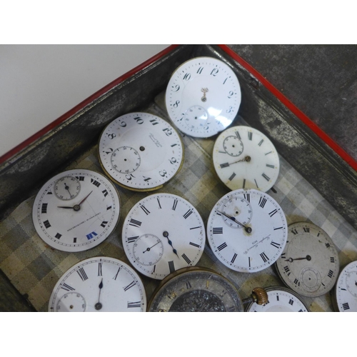 659 - A tin of fourteen pocket watch movements