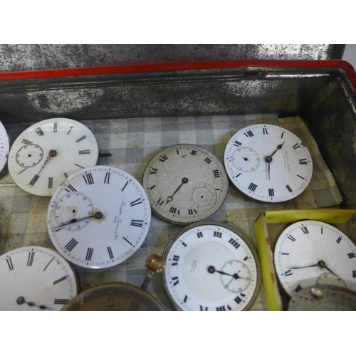 659 - A tin of fourteen pocket watch movements