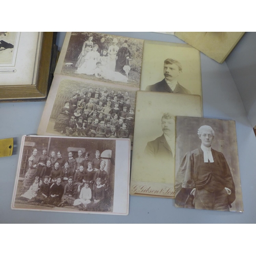 661 - Two carte de visite albums and cabinet cards