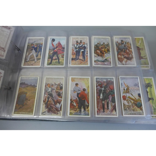 666 - Cigarette cards; ten sets of Players cigarette cards in album including Poultry, Napoleon, Victoria ... 