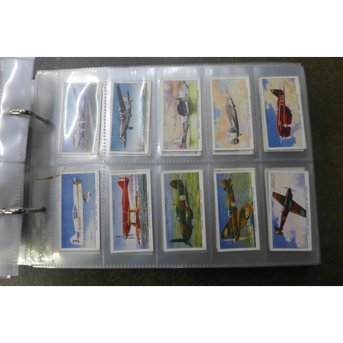 722 - Cigarette cards; an album of ten sets of Wills cigarette cards including Association Footballers