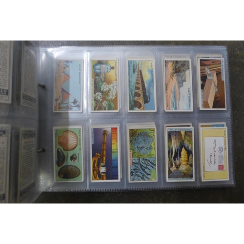 722 - Cigarette cards; an album of ten sets of Wills cigarette cards including Association Footballers