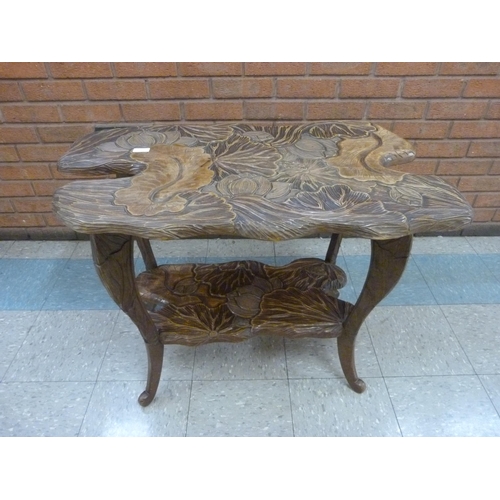 1 - A Liberty & Co. Arts and Crafts carved softwood Japanese style occasional table