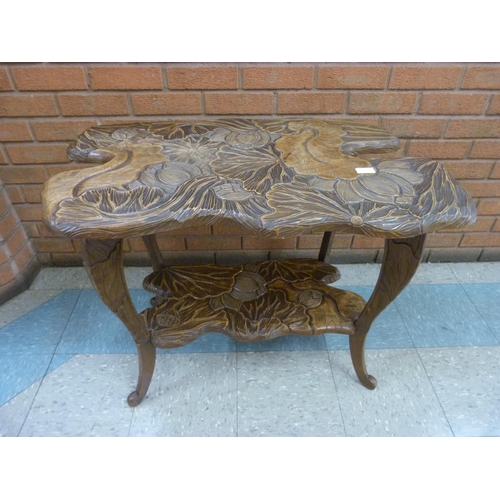 1 - A Liberty & Co. Arts and Crafts carved softwood Japanese style occasional table