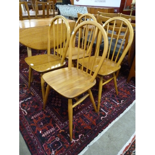 100 - A set of Ercol Blonde elm and beech Windsor chairs