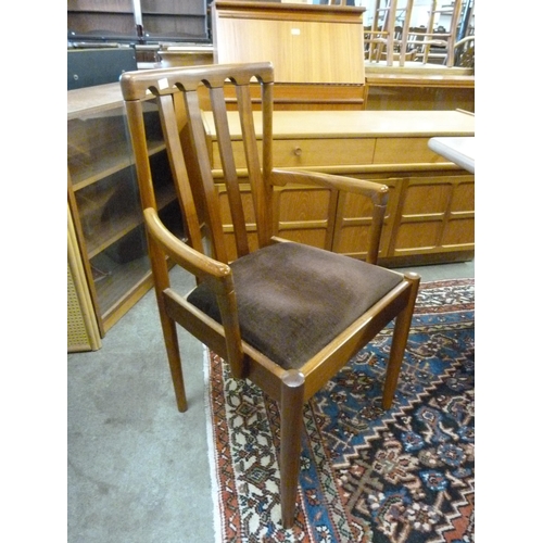 103 - A Meredew teak extending dining table and six chairs