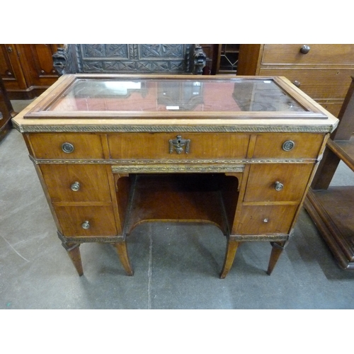 112 - A French Empire style mahogany bijouterie table