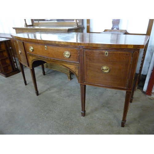 113 - A Regency inlaid mahogany bow front sideboard