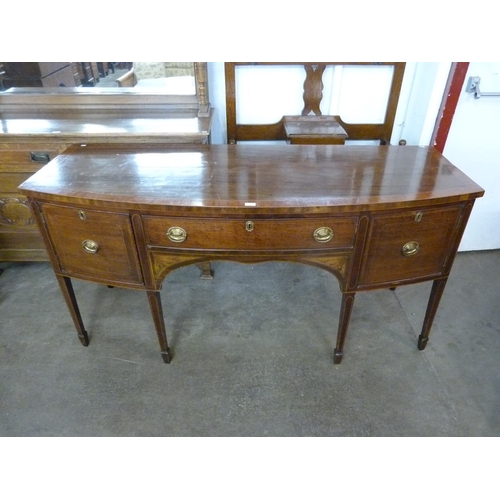 113 - A Regency inlaid mahogany bow front sideboard