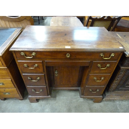 118 - A George II mahogany kneehole desk