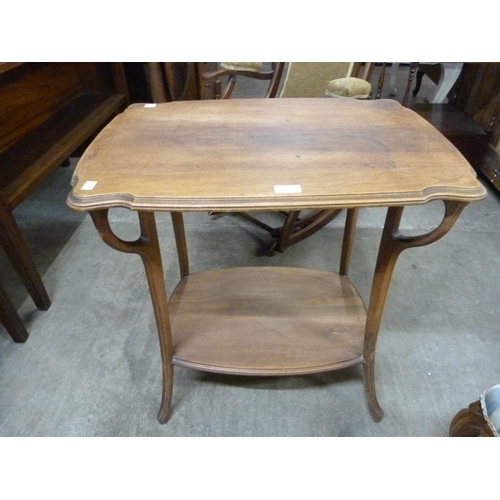 135 - A French Art Nouveau walnut occasional table